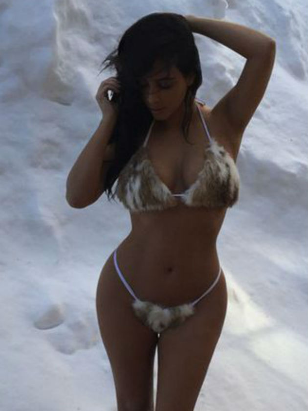 Celebrity boobs on the loose! Kim Kardashian joins the gallery as she shares her crazy snow photo shoot…