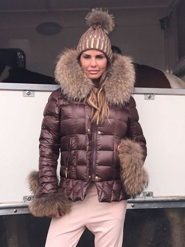 ‘Vile!’ Katie Price angers fans by posing in coat made of raccoon fur
