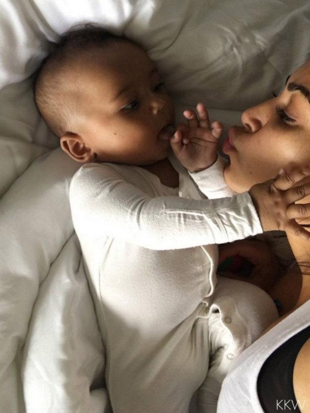 Kim Kardashian kisses Saint West in moving new pictures as he celebrates first birthday