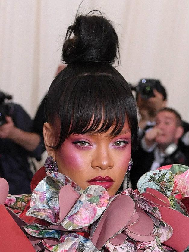 Rihanna just threw MAJOR shade at other Met Gala celebs for their tame outfits