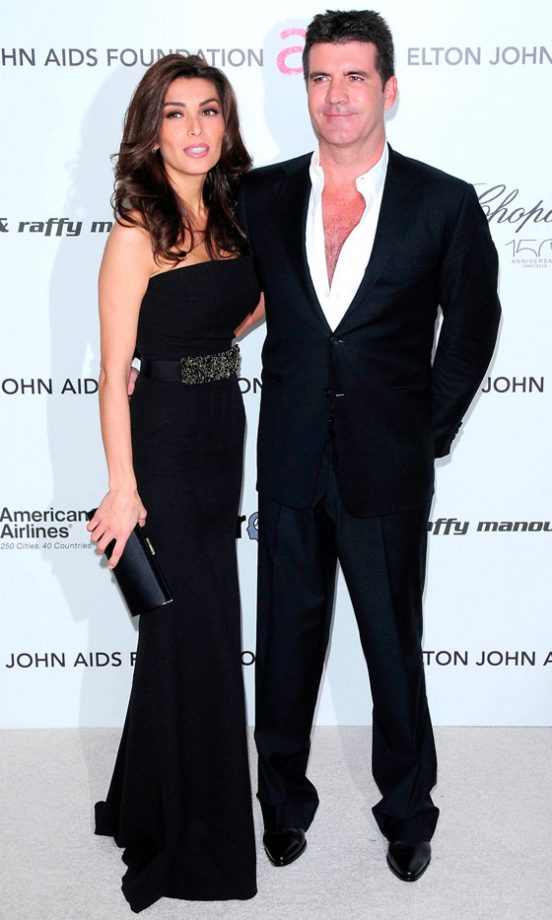 Simon Cowell and Mezhgan Hussainy At The Elton John AIDS Foundation Oscars 2010 Party