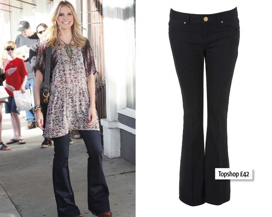 Heidi Klum works this season's hottest trend, the Seventies, in flared jeans