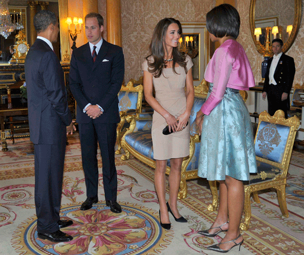 The Duchess of Cambridge wears a Reiss dress to meet Michelle Obama at Buckingham Palace
