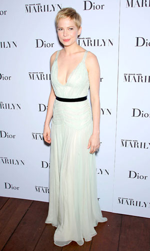 Michelle Williams wearing a Dior dress on the red carpet