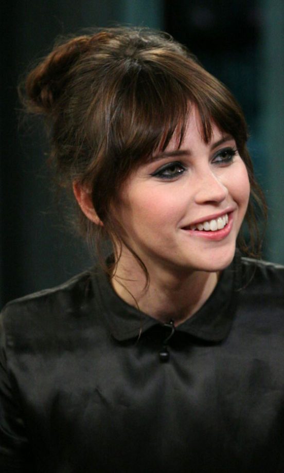 Felicity Jones Earns Some Serious Beauty Brownie Points With This Bun Hairstyle And Choppy Fringe. 2011