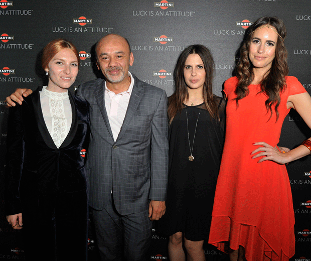 Josephine De La Baume, Christian Louboutin and Louise Roe on the red carpet at the MARTINI Royale casting party