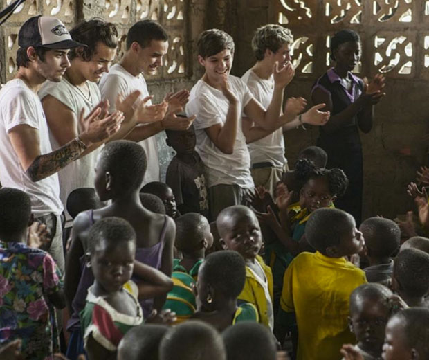 One Direction's management shared this gorgeous pic of the boys with some local children