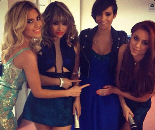 Frankie Sandford shows off baby bump
