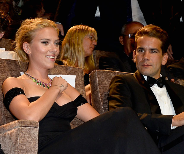 Scarlett watches her new flick with fiance Romain Dauriac at the Venice Film Festival