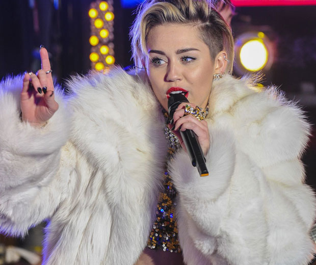 Miley Cyrus has denied she spoke about Beyoncé in an interview with LOVE magazine
