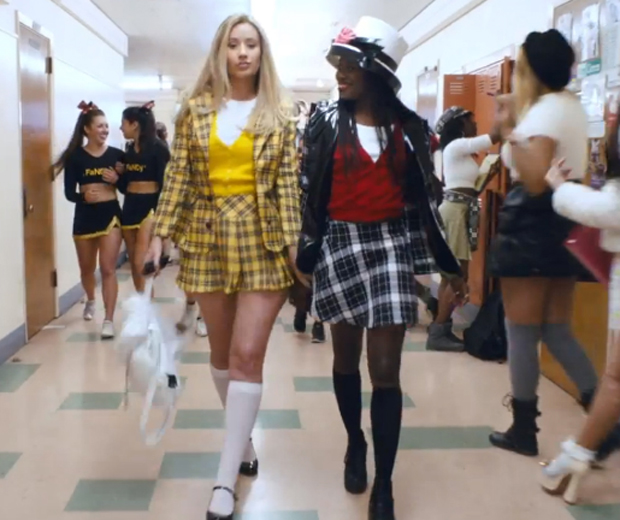 Iggy works Cher's signature uniform in her new video for Fancy