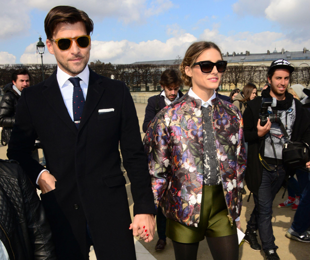 Olivia rocked a floral bomber and silk shorts to Valentino's Paris Fashion Week show