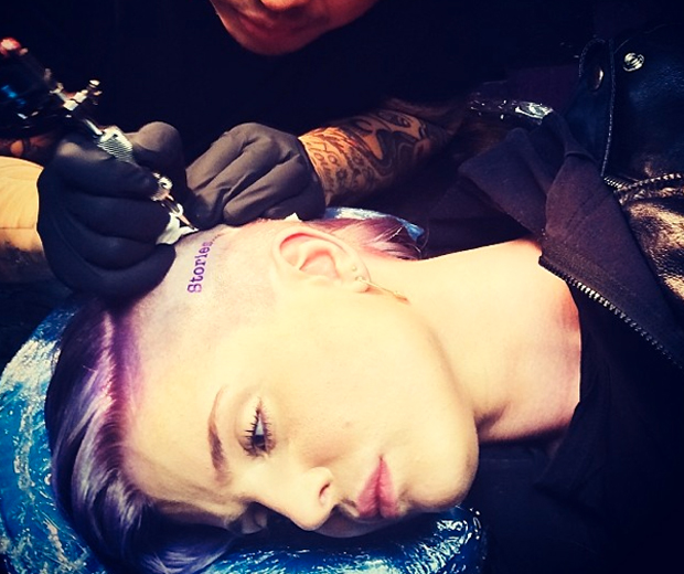 Kelly turned to celeb-adored tattoo artist Dr Woo for her painful-looking head stamp