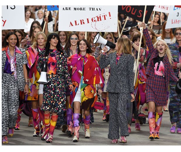 Cara was wielding a megaphone as she led her fellow supermodels in Karl's protest finale
