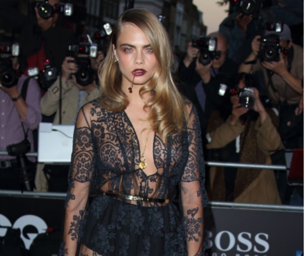Cara's vampy Burberry look