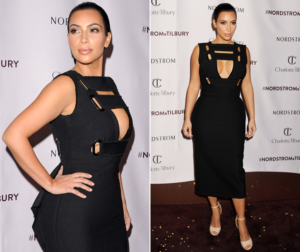 Kim Kardashian works a caged lattice dress at the Charlotte Tilbury make-up party in LA