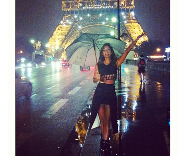 Nicole works a caged crop top and dramatic two-length maxi skirt in Paris