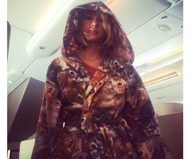 Miaow-velous! Taylor's loving her new cat-print dressing gown...
