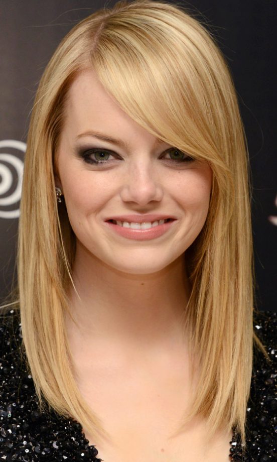 Long Haircut: Emma Stone's Sweeping Fringe Adds Interest To Naturally Fine Hair, 2012