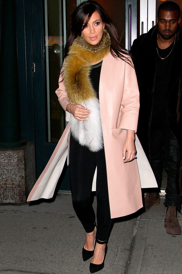 Kim Kardashian Opts For A Faux Fur Scarf And Her Pink Winter Staple Coat In New York, 2014