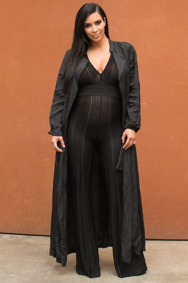 Kim Kardashian Goes Braless And Flaunts Her Bump In A Sheer Stripe Flared Romper At NeueHouse, 2015