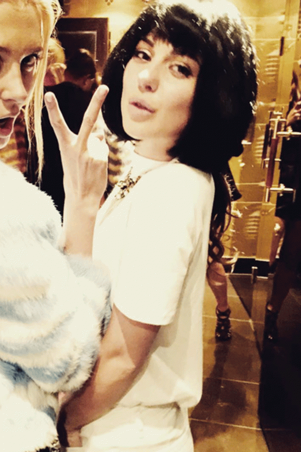 MIC's Louise Thompson Tries On A Fringed Uma Thurman Wig On The King's Road, 2015