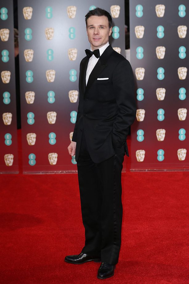Rupert Evans posed like a pro in his smart suit