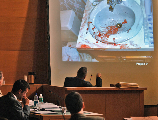 Pictures from the scene being displayed in court. (Photo: PA Photos)