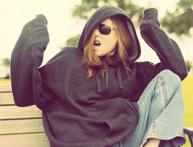 Messily dressed woman on a bench