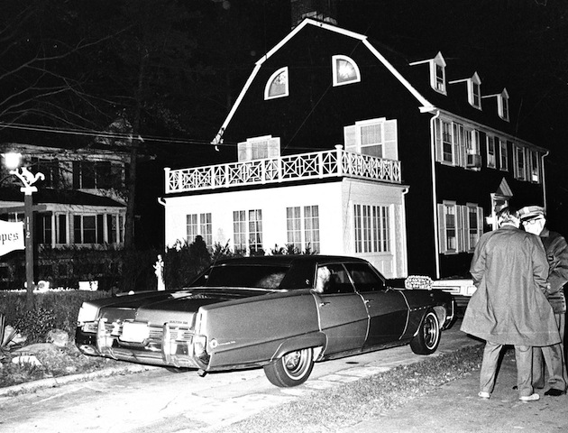 Police investigate the murders (PA Photos)