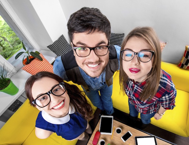 Three people wearing glasses