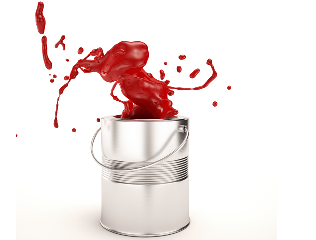 image of red paint sloshing out of paint tin