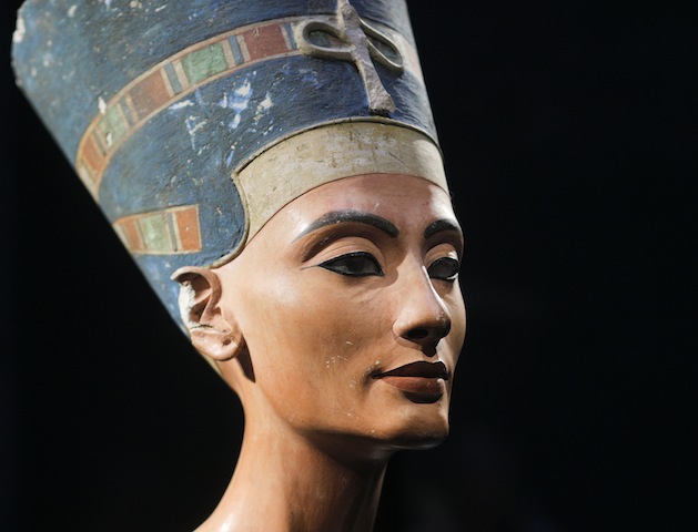 FILE - In this Oct. 15, 2009 file photo, a 3,300-year-old bust of Queen Nefertiti is seen at the New Museum, in Berlin, Germany. Egypt's Antiquities Ministry announced Wednesday, Aug. 19, 2015, that it is inviting an Egyptologist behind a theory that the tomb of Queen Nefertiti may be located behind King Tutankhamun's 3,300-year-old tomb in the famed Valley of the Kings. British-educated expert Nicholas Reeves has been invited to Cairo in September to debate his theory with Egyptian colleagues. (AP Photo/Markus Schreiber, File)