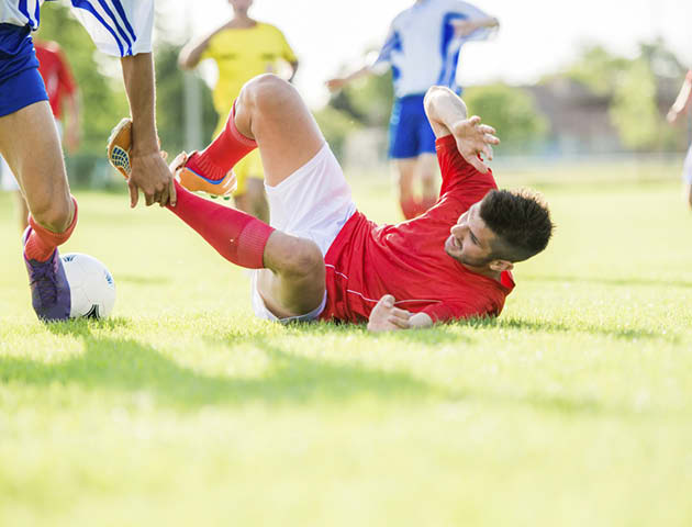 diving football player