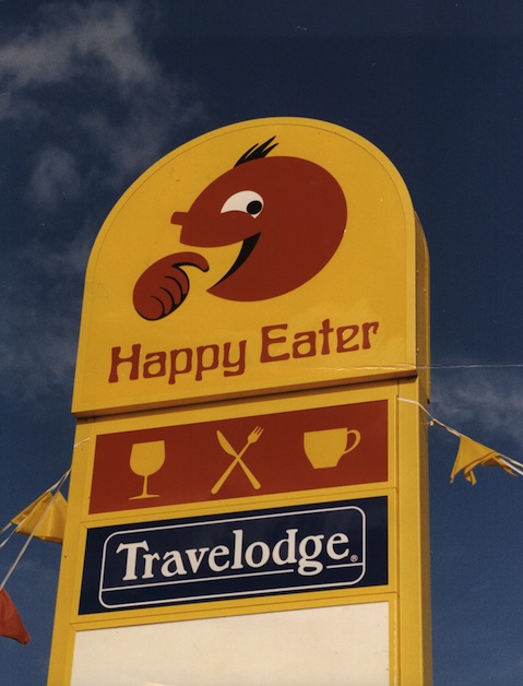 Mandatory Credit: Photo by John Sherbourne/ANL/REX/Shutterstock (1683394a) Happy Eater Motorway Service Restaurant Sign 1992. Happy Eater Motorway Service Restaurant Sign 1992.