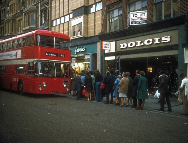 Mandatory Credit: Photo by Simon Webster/REX/Shutterstock (3780854a) A bus queue in Oxford city waiting to board a bus to North Hinksey, Oxfordshire Oxford, Britain - 1975