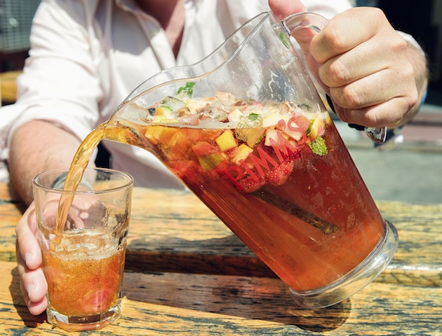 Sun: man pouring Pimms