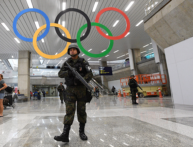 Mandatory Credit: Photo by Canadian Press/REX/Shutterstock (5821753b) Armed soldiers patrol the airport in Rio de Janeiro Rio 2016 Olympic Games, Preparations, Brazil - 02 Aug 2016
