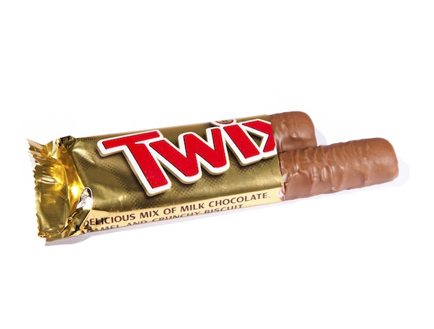 Bangkok, Thailand - Septembre 10, 2011: Isolated Twix chocolate bar on white background. Twix is a biscuit finger product by Mars Inc.