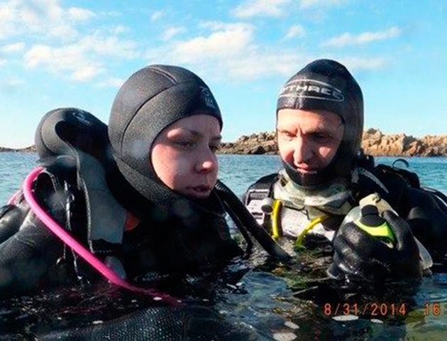 Lucy scuba diving (Photo: SWNS)