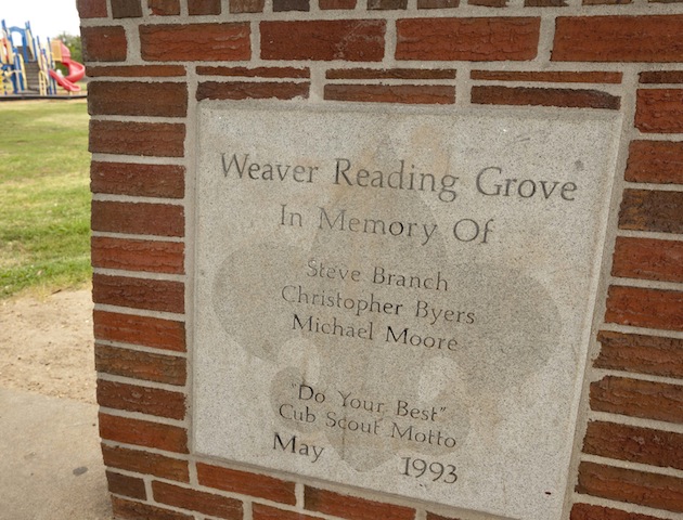 Steve Branch, Christopher Byers and Michael Moore tribute near Weaver Elementary School. Photo: Danny Johnston/AP/Press Association