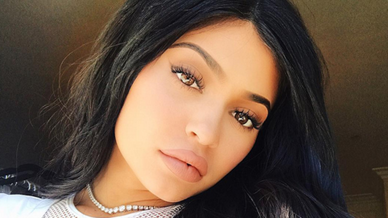 ‘It doesn’t look right!’ Kylie Jenner strips off for new shop launch – and fans are VERY confused