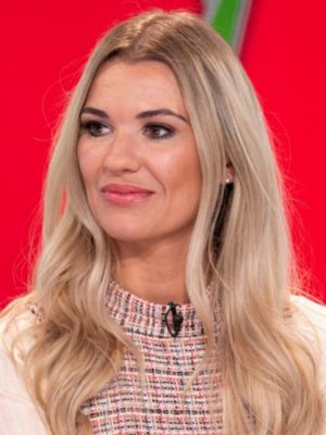 WOW! Christine McGuinness looks AMAZING as she shows off her cleavage in red lacy underwear