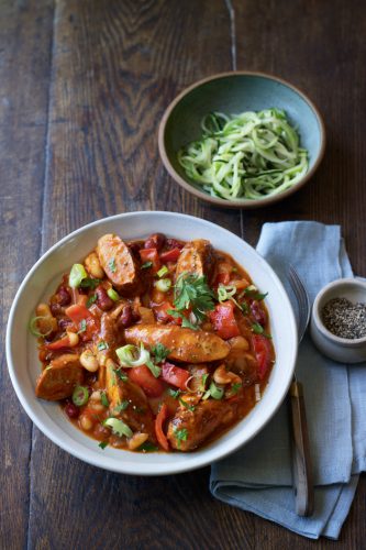 This smokey sausage and bean stew is comfort food at its best!