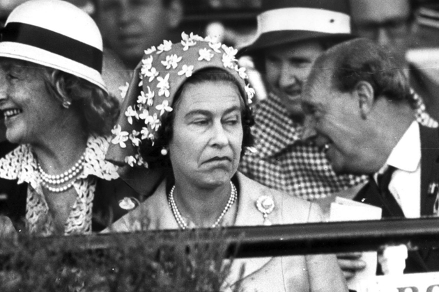 Her Majesty looks less than impressed watching the races in Melbourne in 1977!