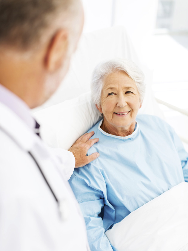 Woman in bed for her hospital stay