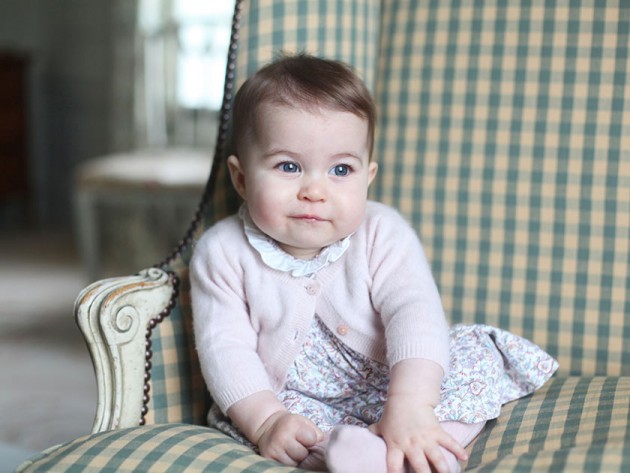 Princess Charlotte sitting on the sofa 2015