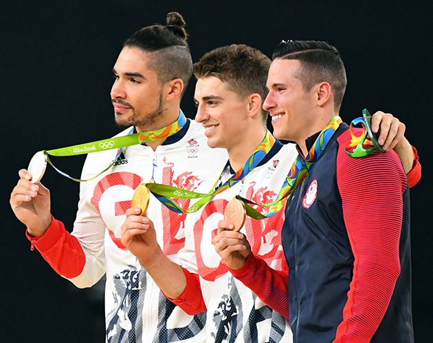 Louis Smith (L) and Max Whitlock (C) scored silver and gold respectively in the pommel horse event