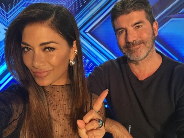 Nicole Scherzinger and Simon Cowell