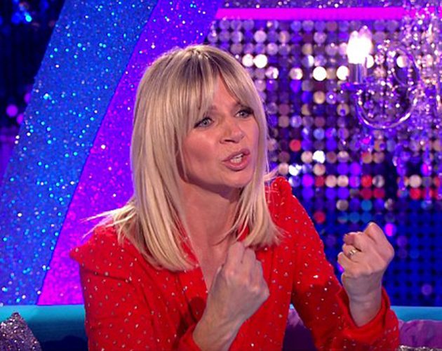 Zoe Ball made no effort to hide her wedding ring yesterday